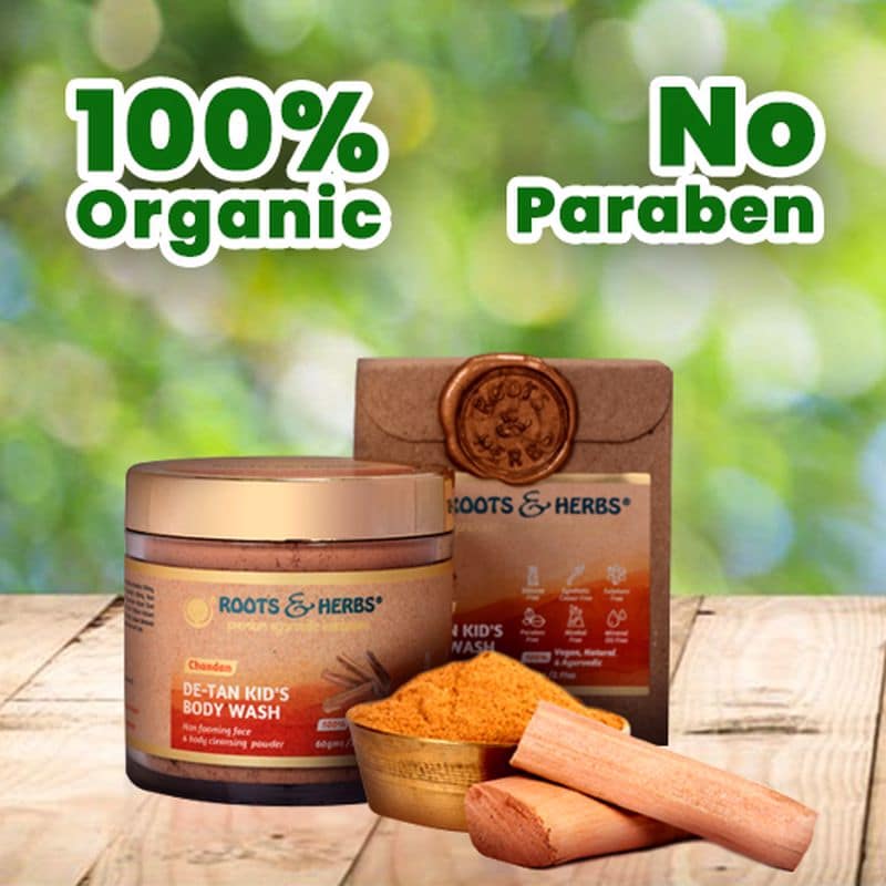 Chandan De-Tan Kid's Body Wash jar and box on a wooden table with sandalwood sticks, labelled 100% Organic, No Paraben